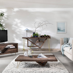 There is an image of a modern and stylish living room. The living room has a gray and white color scheme, with a gray couch, a wooden coffee table, and a wooden TV stand. There are also plants and decorative items in the room.