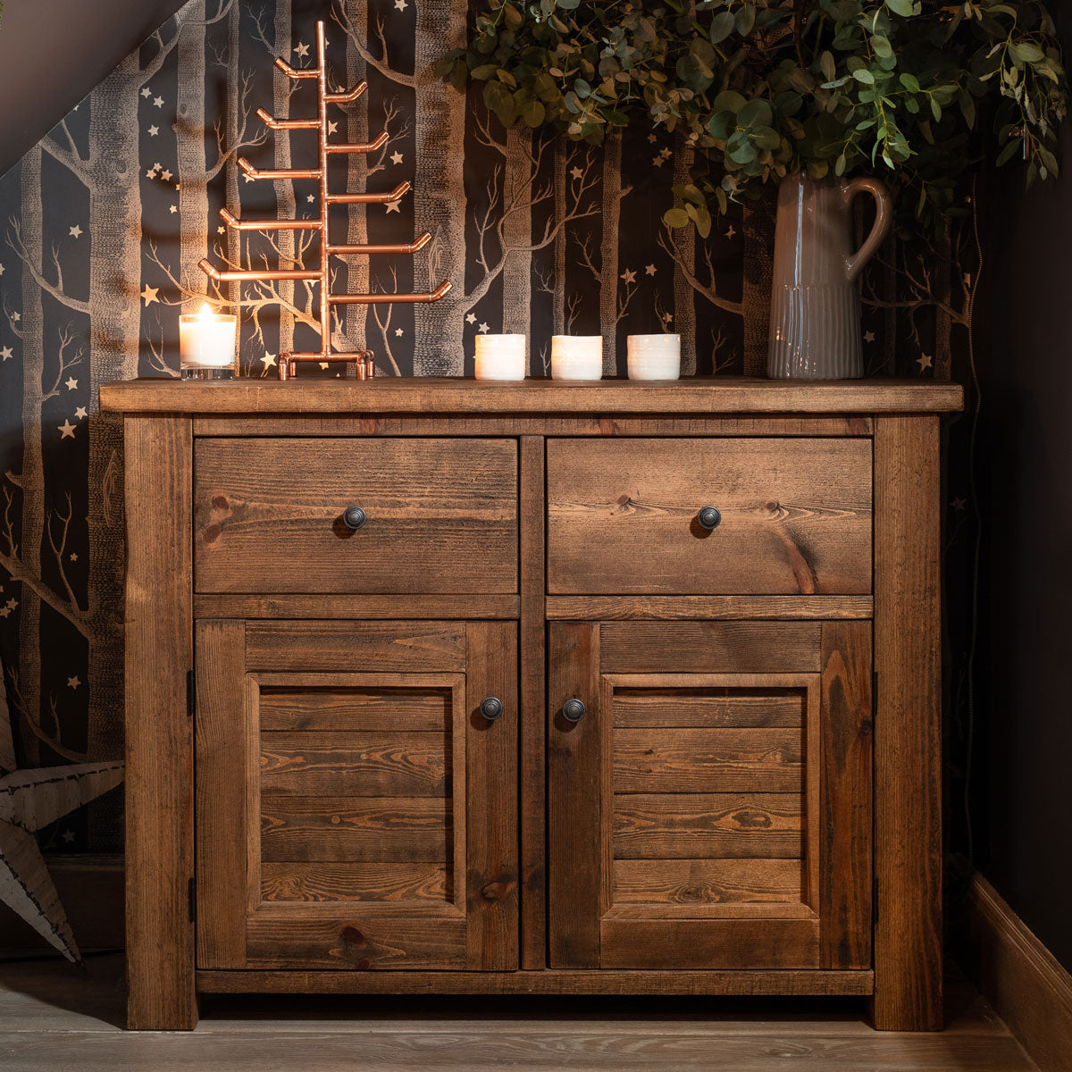 Solid wood traditional style sideboard with draws and cupboards in a cosy nook