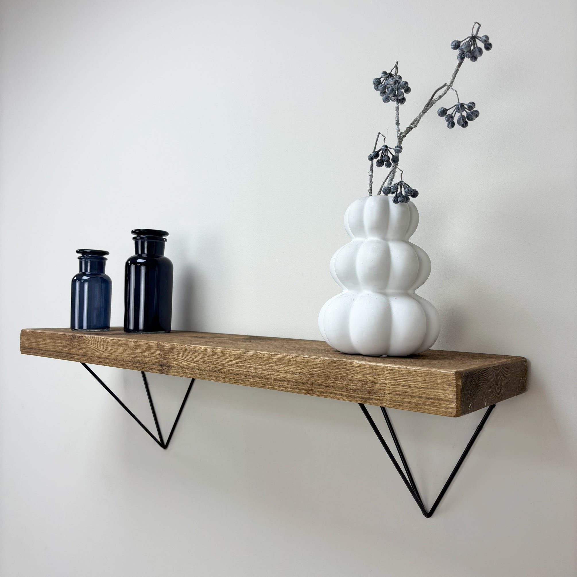 Bowes Rustic Wooden Shelf with Black Metal Brackets - 22cm x 4.5cm - medium oak