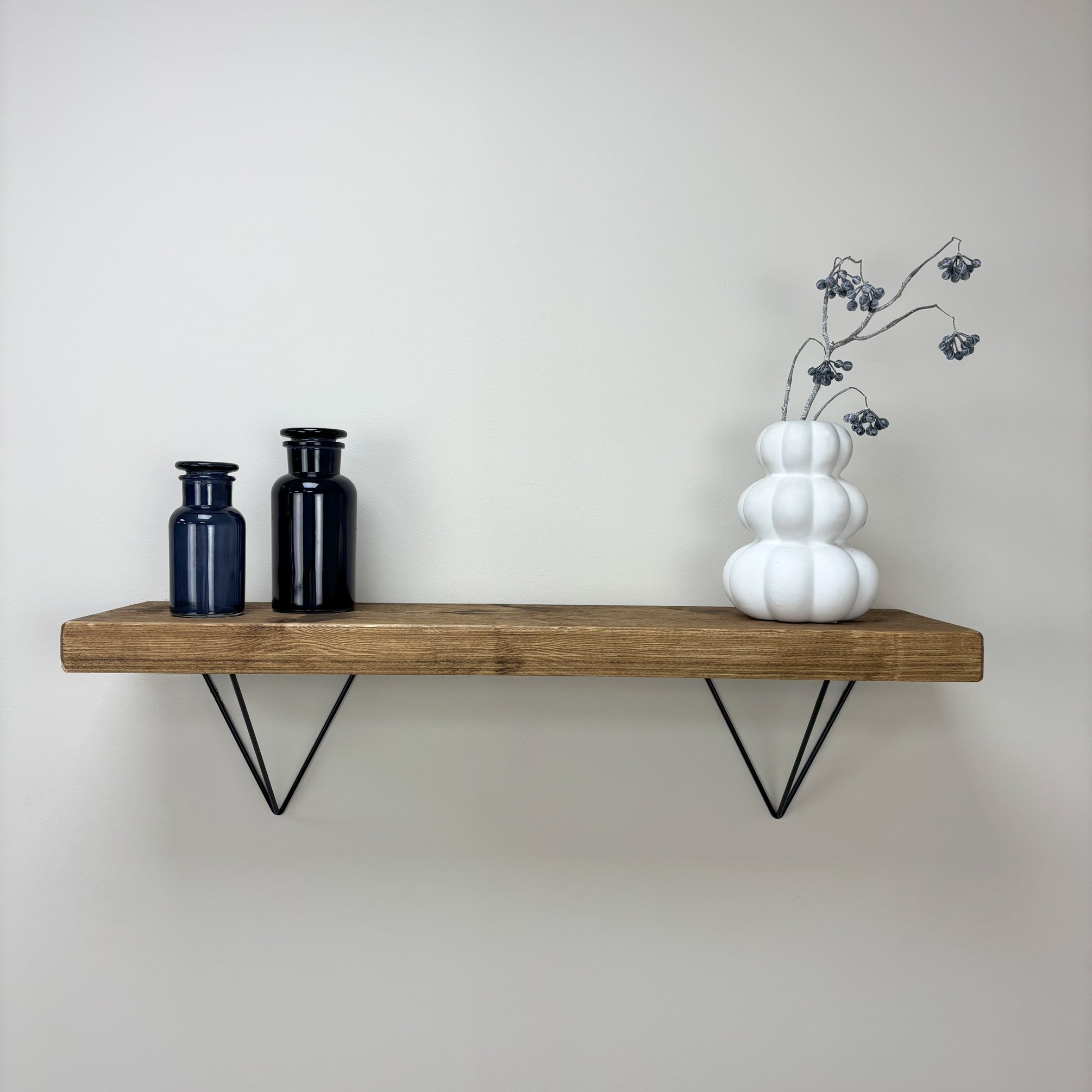Bowes Rustic Wooden Shelf with Black Metal Brackets - 22cm x 4.5cm - medium oak