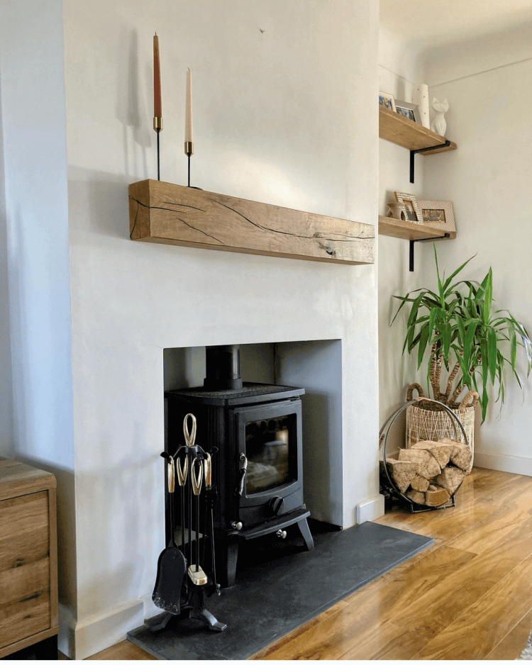 Floating mantel beam above fireplace