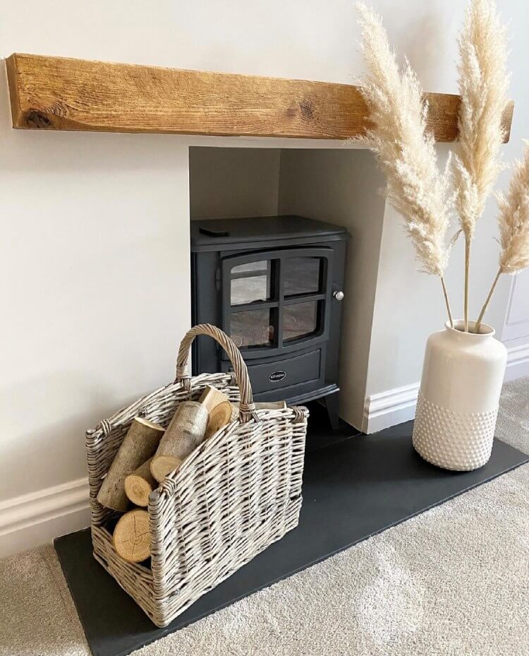 Floating mantel beam above fireplace