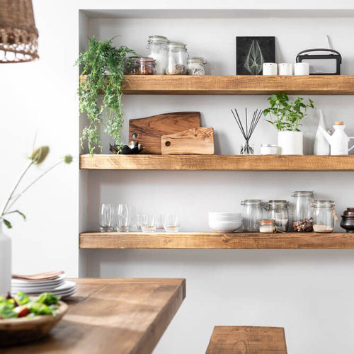 Floating wooden shelves in alcove