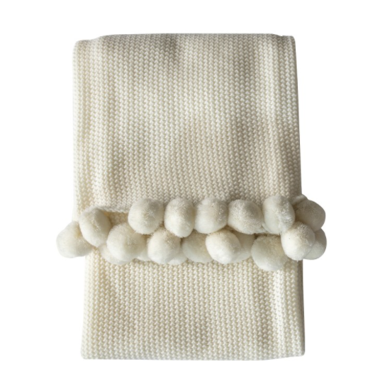 Cream knitted pom pom throw hotsell